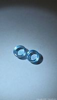 Pair of round sky blue topaz cabochons