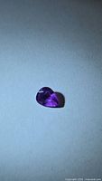 Pear-cut purple sapphire frontal view