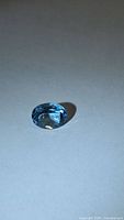 Front view of oval sky blue topaz