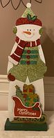 Full view of wooden snowman decoration front
