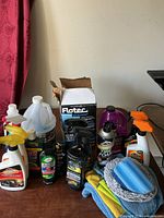 Overview showing Flotec box, auto fluids, towels and mitt