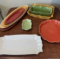 Group view of all nine ceramic serving pieces laid out