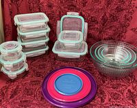 Group shot of all glass storage containers, Pyrex bowls, and lids