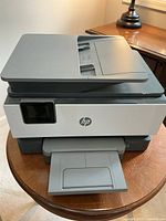 Full view of HP OfficeJet Pro 9018 printer on table