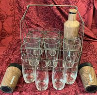 Full lot showing metal basket, clear glasses, Corkcicle bottle and tumblers