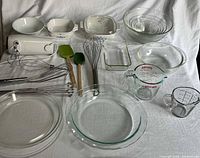 All items laid out including bakeware, mixer, utensils