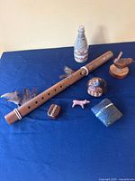 Group shot of all visible items laid out on blue cloth