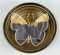 Top view showing butterfly design and glaze pattern
