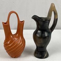 Both vases side by side for scale and overall view