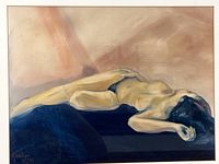 Close view of artwork showing reclining nude image