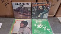 Front view of all four LP covers: B.T. Express, U-Roy, Coco Tea, Studio One Showcase