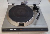 Full view of Denon DP-30L turntable with dust cover open