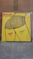 Front sleeve of Punaunie LP with yellow artwork