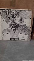 Front cover artwork of Revolver LP