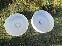 Top view of two matching round white sinks