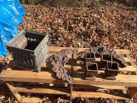 overview of planter, scroll panels, and four legs on pallet