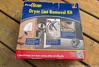 Front of sealed ProClean Dryer Lint Removal Kit box showing contents list and images