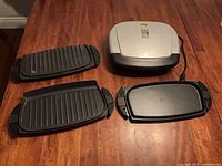 Main grill unit with three removable plates displayed