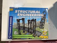 Front of sealed Thames & Kosmos Structural Engineering Bridges & Skyscrapers kit showing main artwork and age range