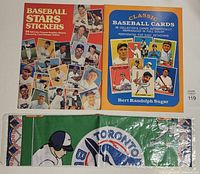 Front covers of both baseball sticker/card books and packaged Blue Jays bandana