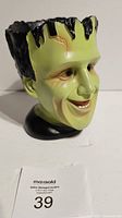 Front left view of resin Frankenstein head planter