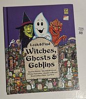 Front cover showing title, characters and cemetery artwork