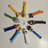 Radial view of all nine Pez dispensers