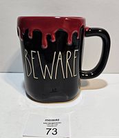 Front view showing BEWARE text and red drip rim