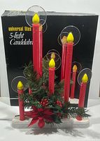 Candelabra in front of original box showing all components