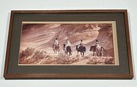 Front view of framed photograph showing full frame and mat