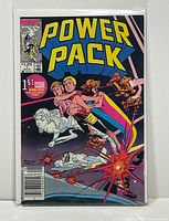 Full front view of Power Pack #1 comic in bag and board