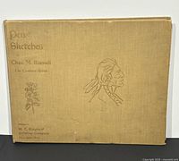 Front cover showing title, gilt Indigenous American profile and floral design