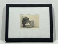 Full view of framed print showing mat and black frame