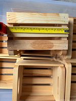 Top view of a box with tape measure showing internal width around 6.5 inches