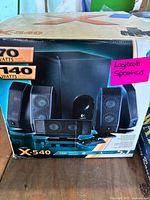 Front of Logitech X-540 box showing speaker system
