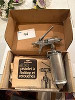 Badger Model 400 spray gun, paint cup, paperwork inside original box