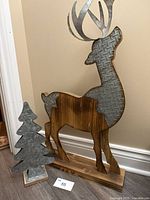 Front view of both deer and tree showing materials and size reference