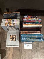 Overview of all DVD stacks on floor with lot number card