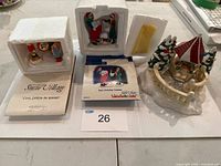 All three Snow Village pieces with packaging