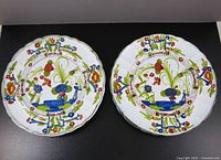 Front view showing both matching Garofano plates