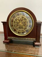 Front view showing entire clock, case color, overall shape