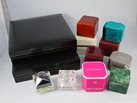 All twelve jewelry boxes grouped, lids closed