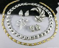 All items overview showing necklaces, brooches, earrings