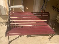 Front view of cast iron and wood bench