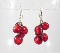 Front view showing both earrings, coral bead clusters and silver hooks