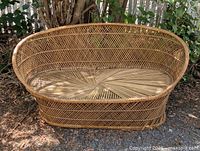 Front view of woven bamboo loveseat