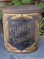 Front view of tin can showing full St. Lawrence Starch Co. graphic