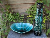 Front view of both BMP items: totem pole lamp base and shallow bowl