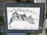 Full view of framed print showing mountain landscape artwork, mat and frame