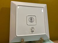 Underside of plate showing Pier 1 Imports mark and sticker